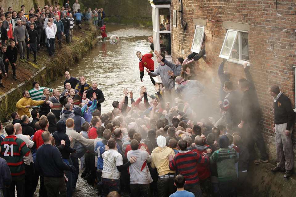 Enthusiasts Participate In The Royal Shrovetide Football Match