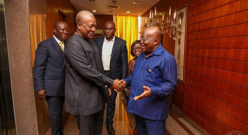 Former president John Mahama and Ghana's president Nana Addo Dankwa Akufo-Addo all smiles