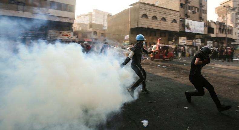 Security forces have relied heavily on tear gas to confine protesters to Baghdad's Tahrir Square, but human rights groups have accused them of improperly firing the canisters directly into crowds at point-blank range