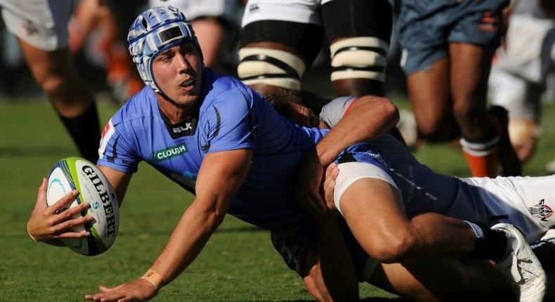 Luke Burton of Australia's Western Force is tackled during a Super Rugby match against South Africa's Southern Kings in Perth on April 9, 2017. Force or the Melbourne Rebels face the axe from next year's revamped Super Rugby competition