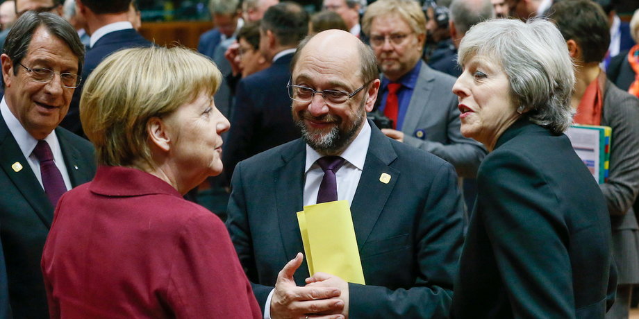 Germany's Chancellor Angela Merkel (L), European Parliament President Martin Schulz (C) and Britain's Prime Minister Theresa May attend a EU Summit at the European Council headquarters in Brussels, Belgium December 15, 2016.