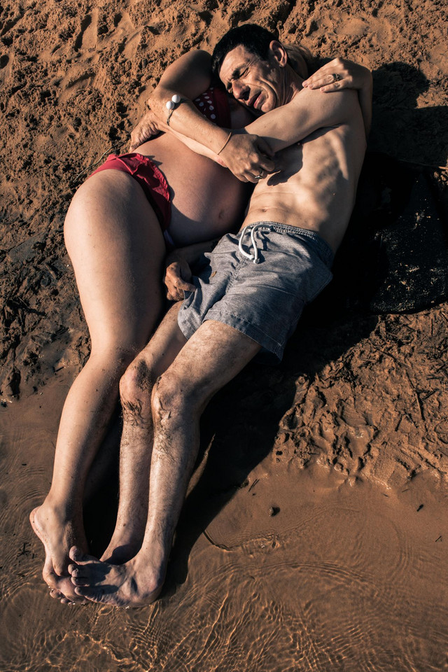 Satrah Malone, "Pregnant Woman and Man on Beach"