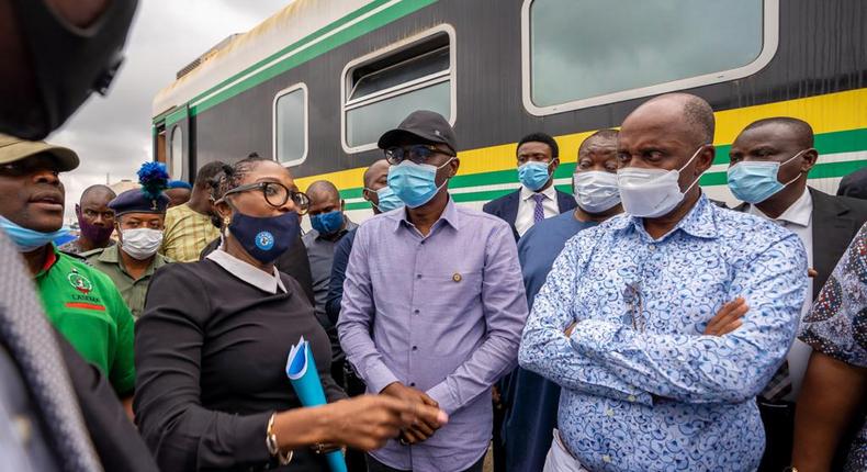 Lagos State governor, Babajide Sanwo-Olu (middle), and the Minister of Transportation, Rotimi Amaechi (right) [LASG]