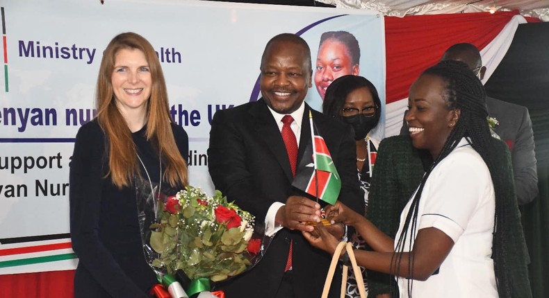 Health CS Mutahi Kagwe with UK High Commissioner to Kenya Jane Marriott as he announced that 19 Kenyan nurses had been deployed to the Oxford University Hospital in Britain