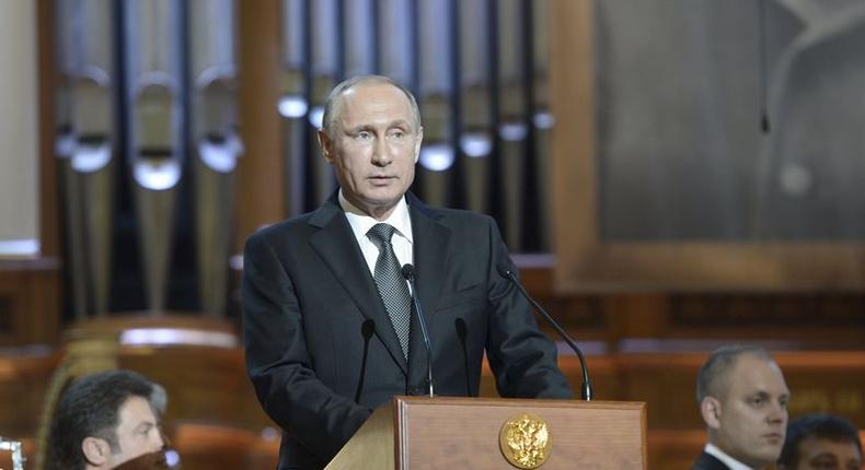 Russian President Vladimir Putin (front) delivers a speech at the gala concert of the 15th International Tchaikovsky Competition at the Moscow Conservatory, Russia, July 2, 2015.   REUTERS/Aleksey Nikolskyi/RIA Novosti/Kremlin