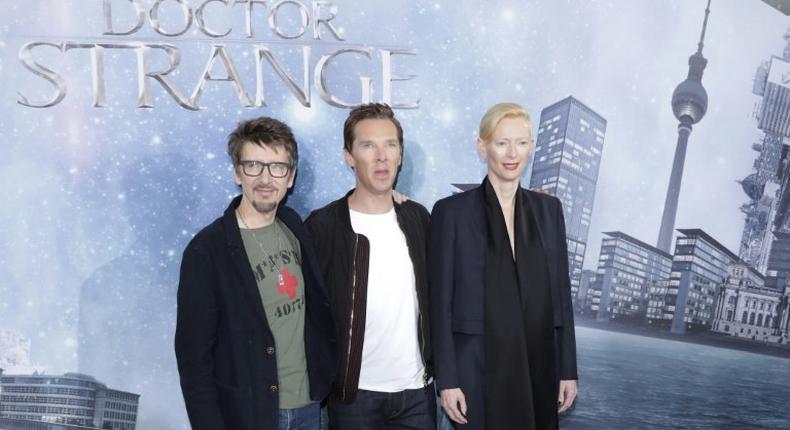 L-R: US Director Scott Derrickson, British actor Benedict Cumberbatch and British actress Tilda Swinton pose for the screening of Doctor Strange in Berlin, on October 26, 2016