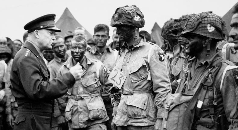 In this June 6, 1944, file photo, U.S. Gen. Dwight D. Eisenhower, left, gives the order of the day to paratroopers in England prior to boarding their planes to participate in the first assault of the Normandy invasion. A dwindling number of D-Day veterans will be on hand in Normandy in June 2019, when international leaders gather to honor them on the invasion's 75th anniversary. (U.S. Army Signal Corps via AP)