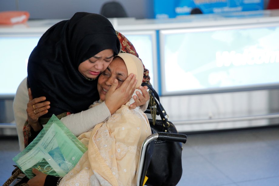 A woman greets her mother after she arrived from Dubai on Emirates Flight 203 at John F. Kennedy International Airport in Queens, New York, U.S., January 28, 2017.