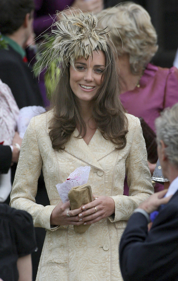 File photograph shows the girlfriend of Britain's Prince William, Kate Middleton, leaving after the wedding of Laura Parker