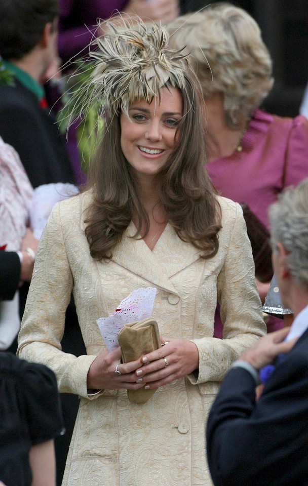 File photograph shows the girlfriend of Britain's Prince William, Kate Middleton, leaving after the wedding of Laura Parker