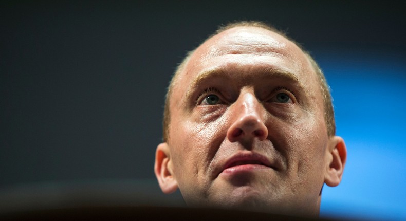 this Friday, July 8, 2016, file photo, Carter Page, then adviser to U.S. Republican presidential candidate Donald Trump, speaks at the graduation ceremony for the New Economic School in Moscow, Russia.