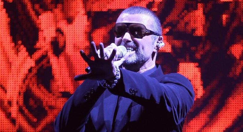 Late British singer George Michael performs on stage in the French city of Nice in September 2011