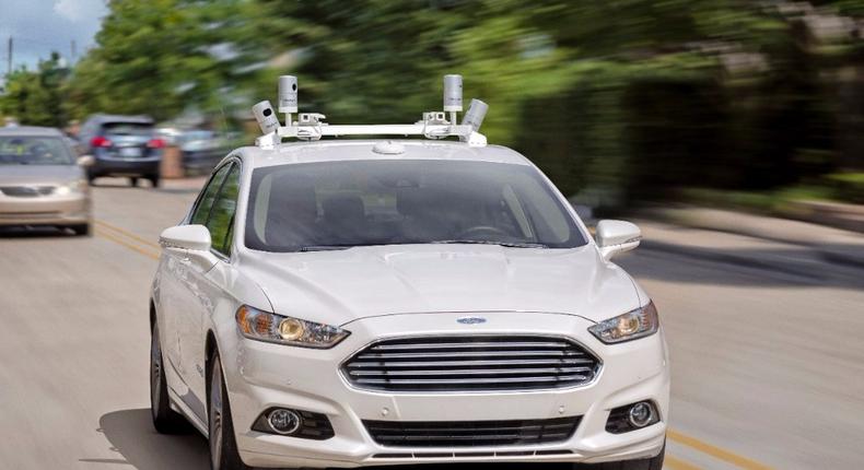Ford fully autonomous Fusion Hybrid research vehicle on streets of Dearborn, MI.