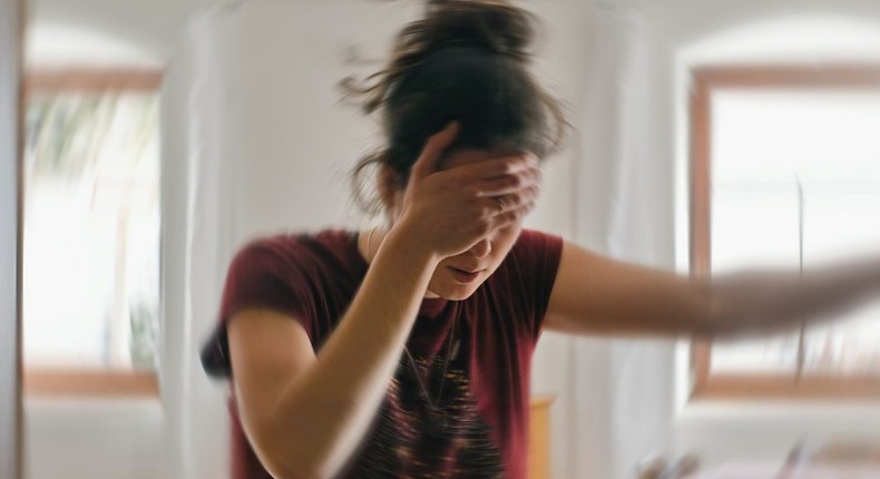 Dizziness can occur when you experience a drop in blood pressure when you shift positions.Tunatura/Getty Images