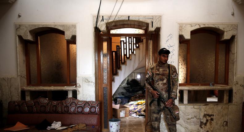 An Iraqi soldier inside an office of the prison.