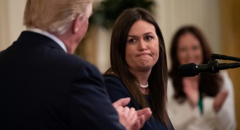 Sarah Sanders, then the White House press secretary, seen in June 2019 at the White House with President Donald Trump