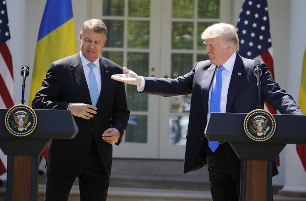 U.S. President Donald Trump welcomes Romanian President Iohannis prior to joint news conference at t