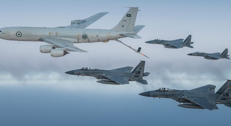 A Royal Saudi Air Force K-3 tanker and F-15Cs fly with US Air Force F-15Cs in June 2019.