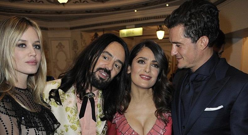 Orlando Bloom stris at Salma Hayeks' massive cleavage at BFAs in London