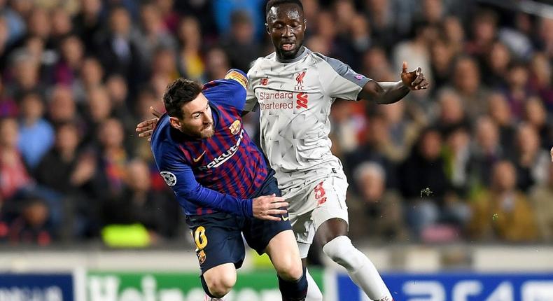 Guinea star Naby Keita (R) playing for Liverpool against Lionel Messi of Barcelona during a UEFA Champions League semi-final last month