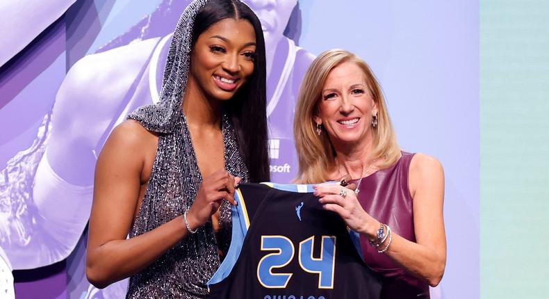Angel Reese poses with WNBA Commissioner Cathy Engelbert at the 2024 WNBA draft.Sarah Stier/Staff/Getty Images