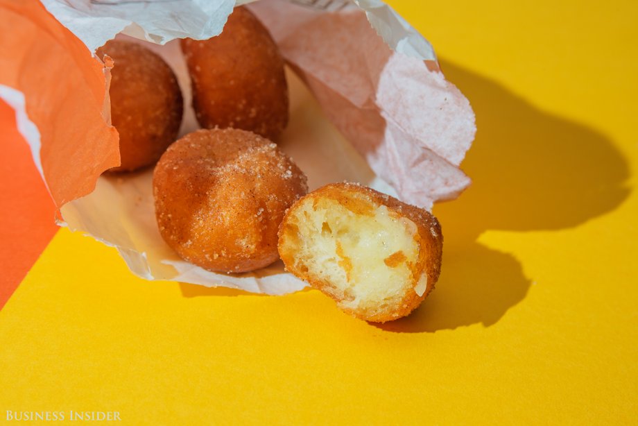 These warm little orbs of tooth-melting sweetness have a slight eggy taste to the dough, but it's rather effectively smothered by the granulated sugar encrusting the outside. The inside is filled with a treacly icing so sweet that it should come with a surgeon general's warning. If you think these are a smart breakfast choice, reconsider your dietary choices. Albeit, they're delicious in a horrible, horrible way — they bring a delight only tooth decay could follow.