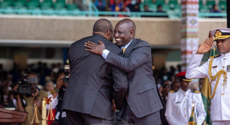 President William Ruto embraces former President Uhuru Kenyatta during the 5th president's inauguration at the Kasarani Stadium on September 13, 2022