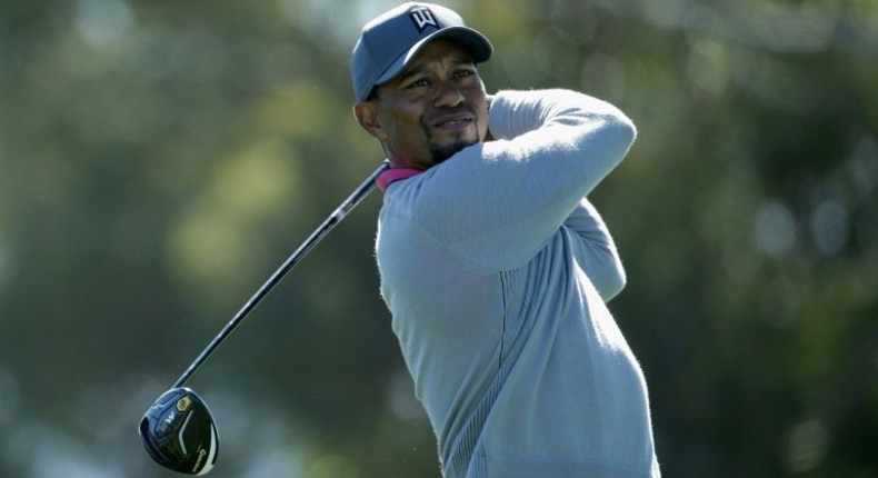 Tiger Woods plays his shot from the second tee during the second round of the Farmers Insurance Open at Torrey Pines North on January 27, 2017