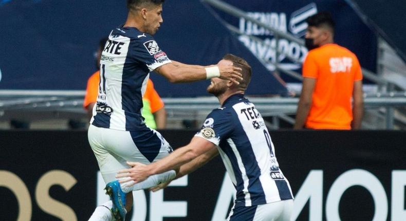 Maximiliano Meza of Mexico's Monterrey celebrates with a teammate after scoring against US club Columbus Crew in a CONCACAF Champions League quarter-final victory Creator: Julio Cesar AGUILAR