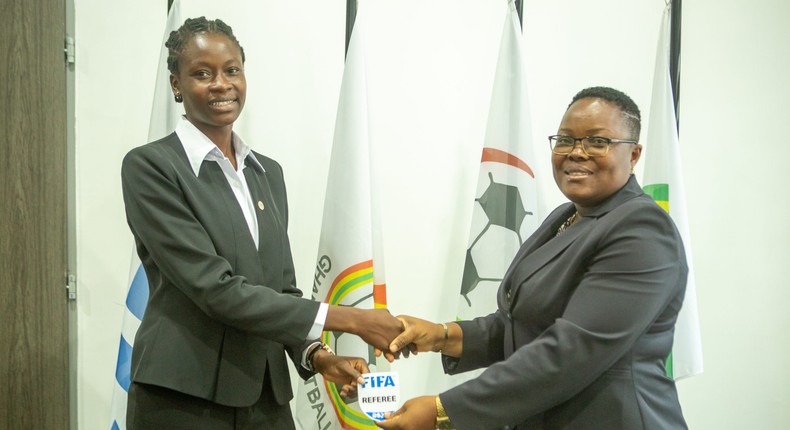 One of the 20 Ghanaian referees receive her Fifa badge