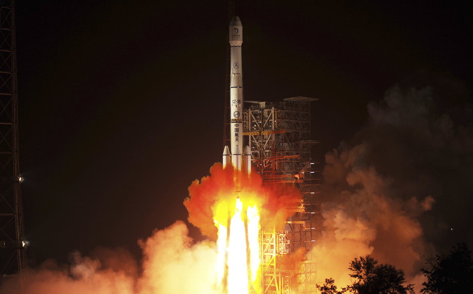 The Long March 3B rocket, carrying China's Chang'e 3 lunar probe, blasts off in 2013. A similar rocket will launch QUESS into orbit.