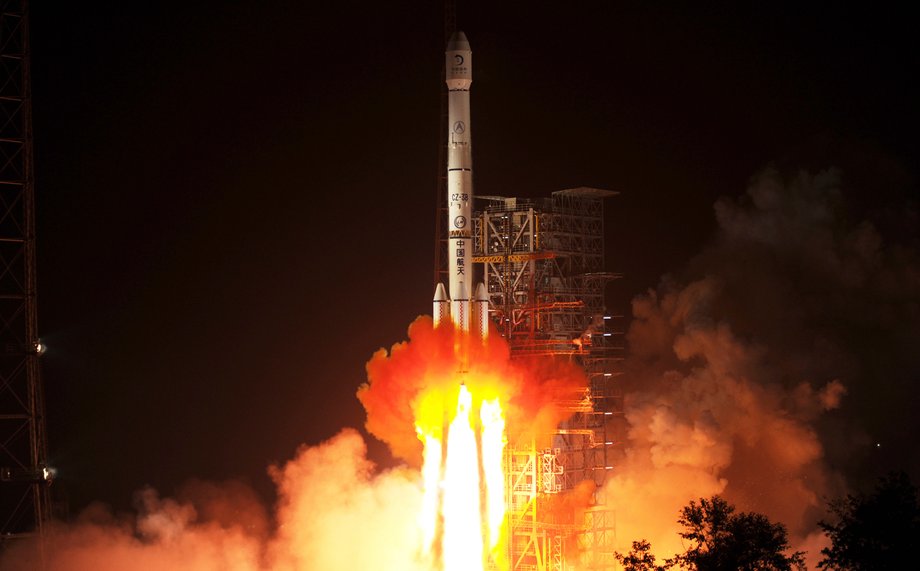 The Long March 3B rocket, carrying China's Chang'e 3 lunar probe, blasts off in 2013. A similar rocket will launch QUESS into orbit.