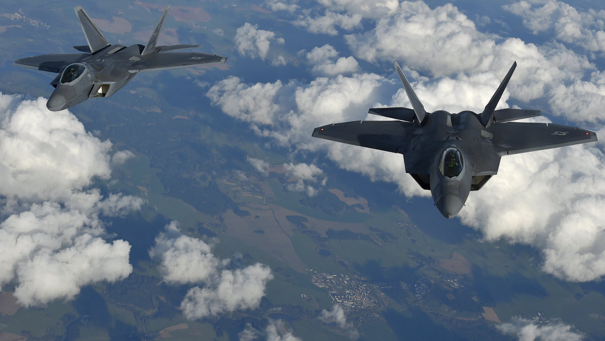 U.S. F-22 Raptor fighters fly over European airspace