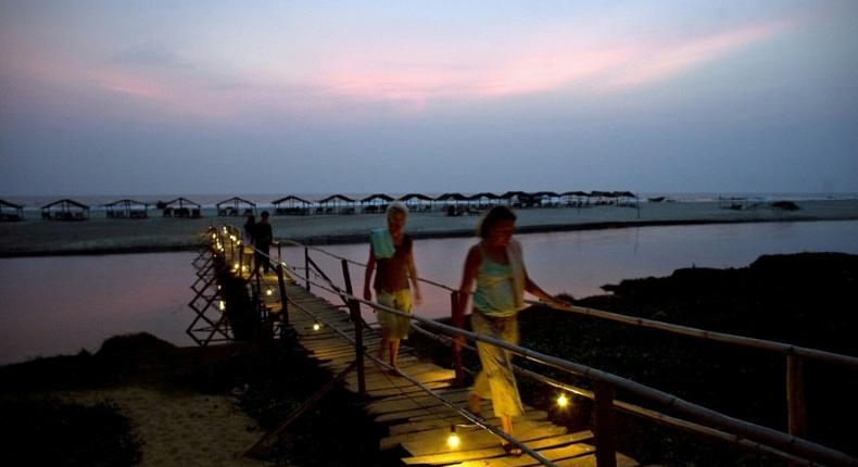 Tourists pictured on Goa's Mandrem Beach