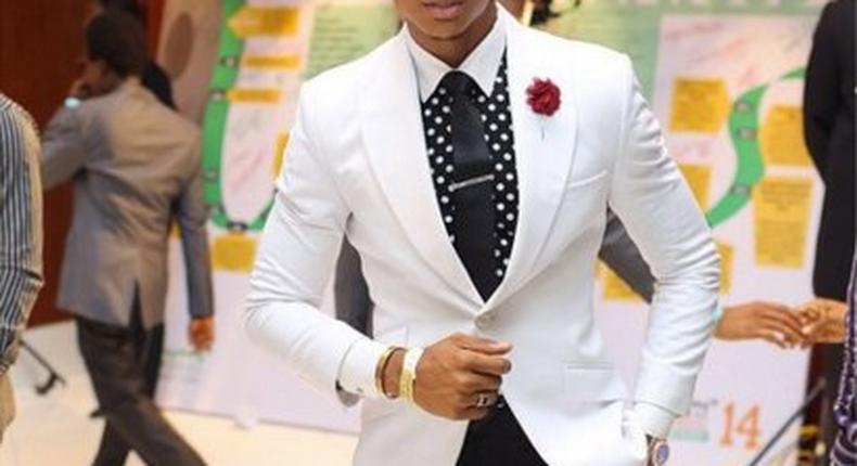 Ik Ogbonna in a black and white ensemble