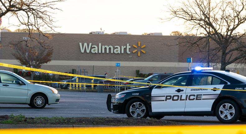 Law enforcement work the scene of a mass shooting at a Walmart, Wednesday, Nov. 23, 2022, in Chesapeake, Va.AP Photo/Alex Brandon