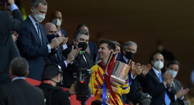 Lionel Messi collects the Spanish Copa del Rey after Barcelona's 4-0 win over Athletic Bilbao in April Creator: CRISTINA QUICLER