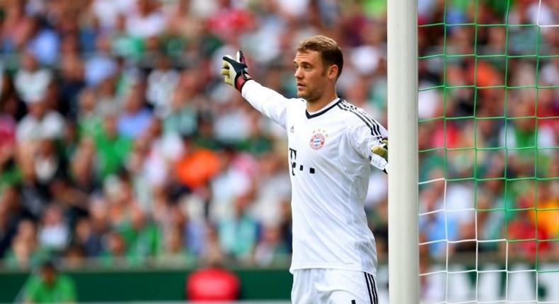 Bayern Munich's goalkeeper Manuel Neuer reacts during the German First division Bundesliga match between Werder Bremen and Bayern Munich in Bremen, northern Germany, on August 26, 2017