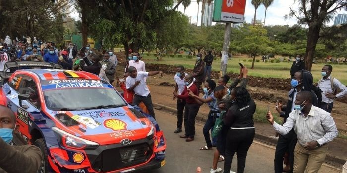 Excited Kenyans cheering Safari Rally drivers