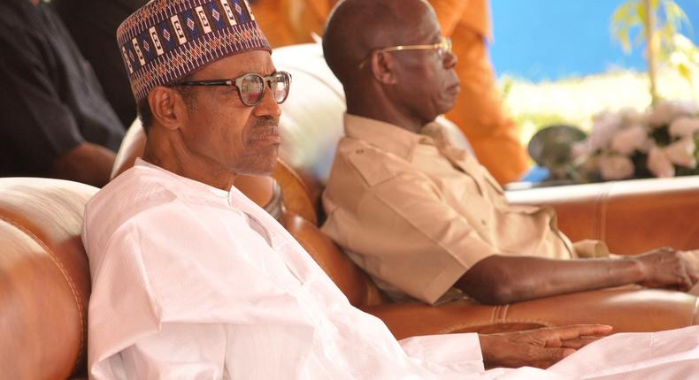 President Muhammadu Buhari with national chairman of the All Progressives' Congress (APC), Adams Oshiomhole