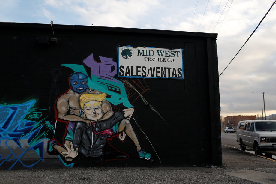 Graffiti of a wrestler applying a choke hold to US President Donald Trump shown in El Paso, Texas, January 17, 2017.