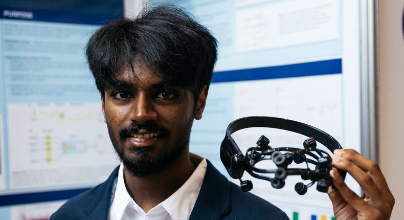 Canadian high school student Anush Mutyala with the headset he used as part of his neural implant science fair project.Canada-Wide Science Fair