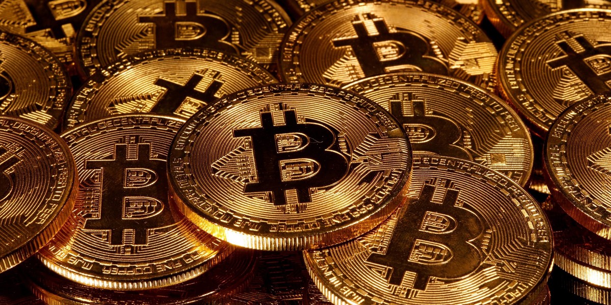 FILE PHOTO: Representations of virtual currency Bitcoin are seen in this picture illustration taken