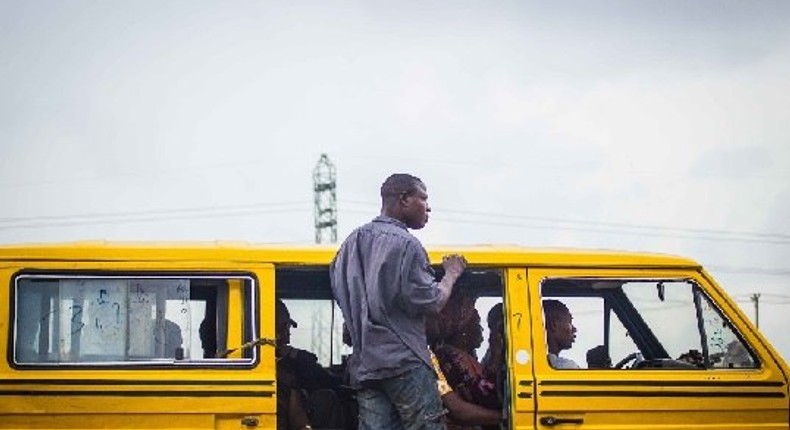 A danfo bus conductor 