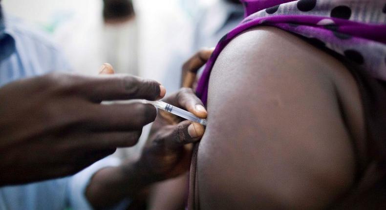 Staff members of the Teaching Hospital receive the first vaccination treatment for yellow fever in El Geneina, West Darfur in this November 14, 2012 handout. 