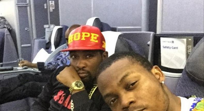 Olamide and hype man, Dotun on the flight to Maryland.