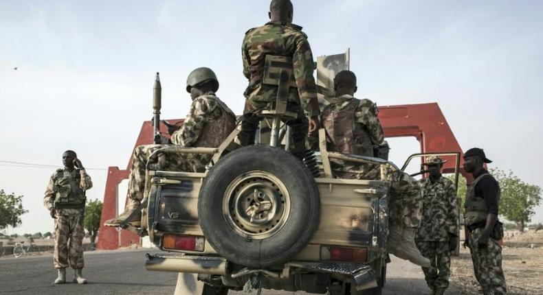 A team of soldiers in military vehicle (Vanguard)