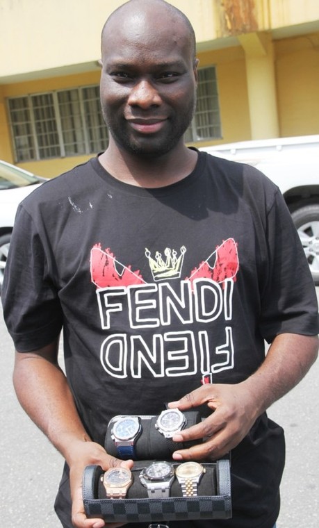 Mompha displays wristwatches seized from him by the EFCC in October (Punch)