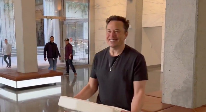 Elon Musk carrying a sink into Twitter's headquarters in San Francisco.Elon Musk/Twitter