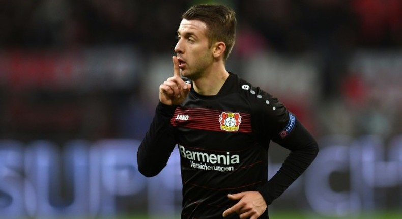 Leverkusen's midfielder Vladlen Yurchenko celebrates scoring the opening goal during the UEFA Champions League group E match between Bayer 04 Leverkusen and AS Monaco FC in Leverkusen, western Germany, on December 7, 2016